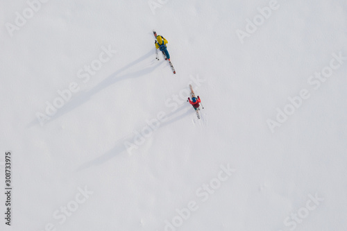 Aerial drone photo of a skier touring in Bucegi mountains photo