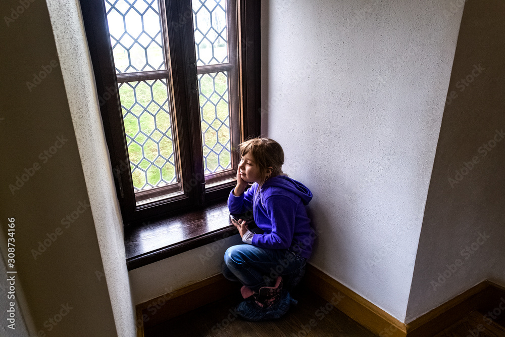little girl sitting by the window, sovtfocus little girl sitting by the window, sovtfocus