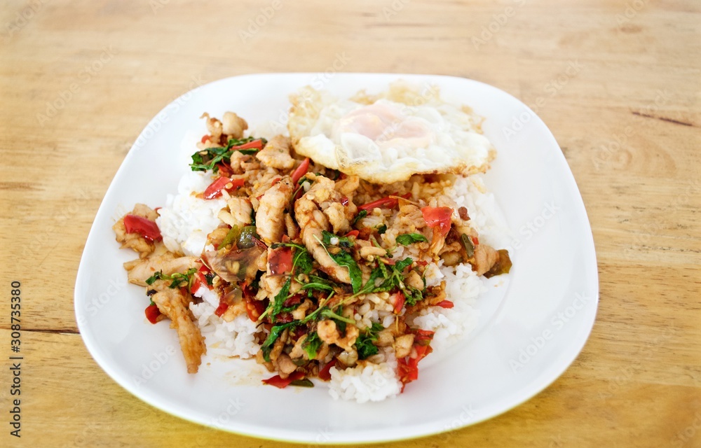 Stir fries Chicken breast with chili and Thai hot basil (Thai street food : Pad Kra Praow Kai) Stir fries Chicken breast with chili and Thai hot basil (Thai street food : Pad Kra Praow Kai)