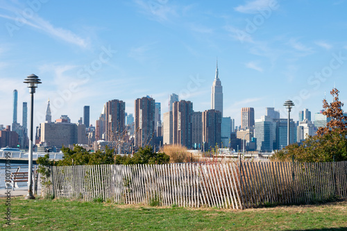 Transmitter Park in Greenpoint Brooklyn New York with a view of the Midtown Manhattan Skyline photo