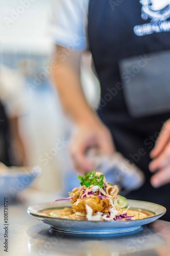 Fototapeta Naklejka Na Ścianę i Meble -  Vegan Baja fish taco on chefs table