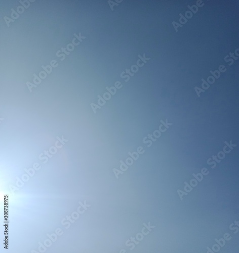 Blue sky and sun background
