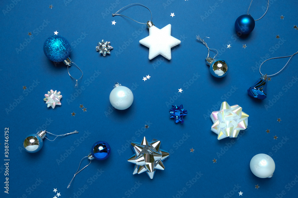 Christmas background with decorations and gift boxes on dark blue background Christmas background with decorations and gift boxes on dark blue background