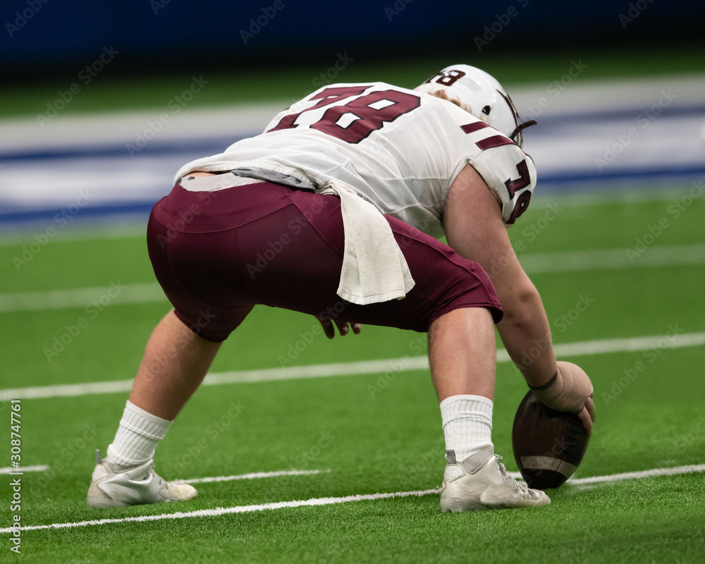 Fototapeta premium Great action photos of football players making amazing plays during a football game