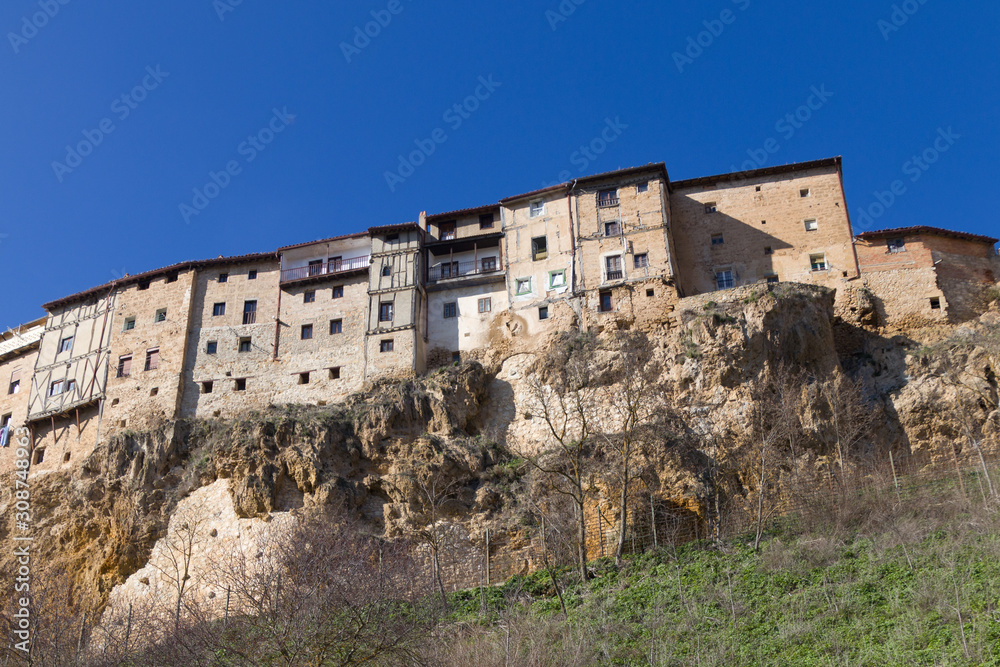 Houses by the border of the cliff