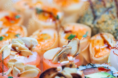 Obraz na płótnie Fresh and colorful sushi pieces w salonie