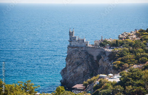 The symbol of the Crimean Peninsula - swallow's nest castle on the background of the sea. Castle Swallow's Nest in Crimea. 