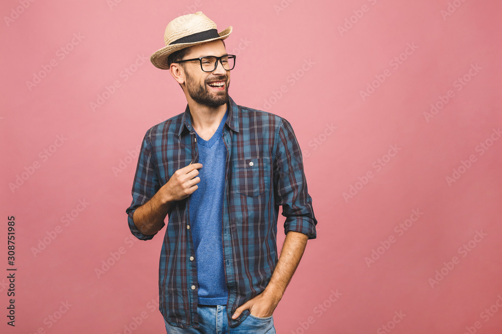 Picture of happy young man standing isolated over pink background. Looking at camera. Picture of happy young man standing isolated over pink background. Looking at camera.