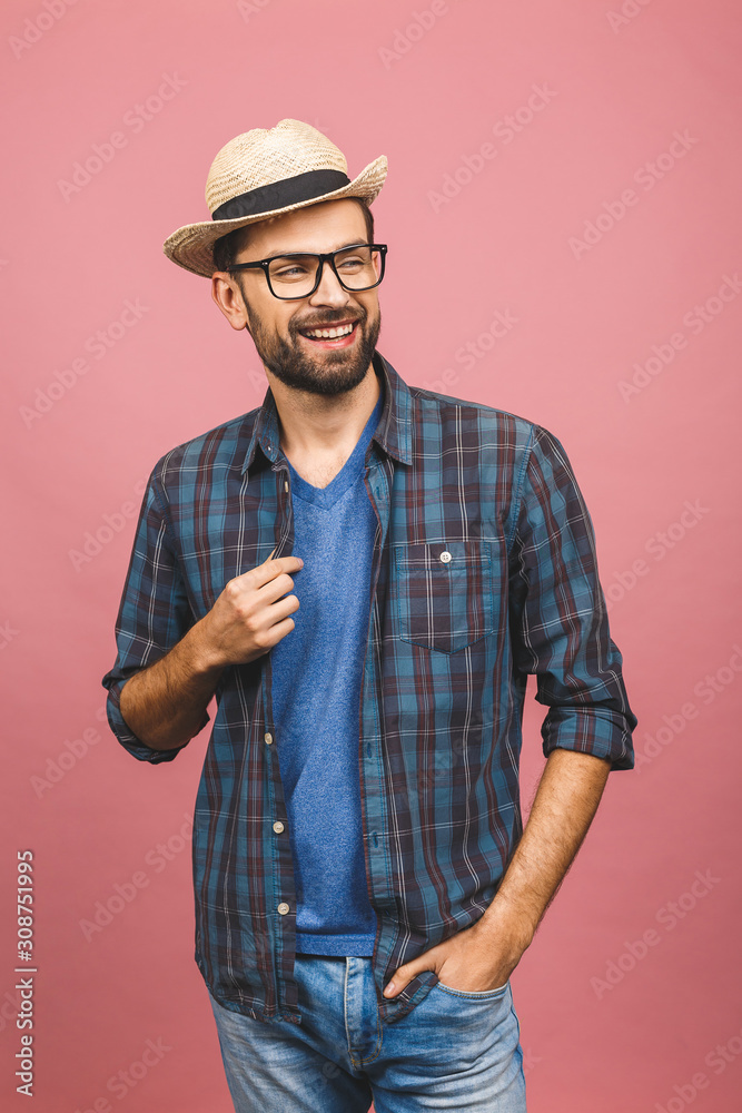 Picture of happy young man standing isolated over pink background. Looking at camera. Picture of happy young man standing isolated over pink background. Looking at camera.