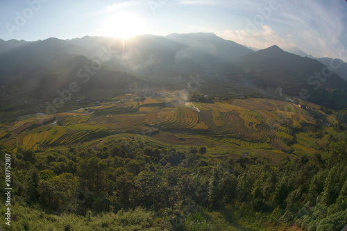 Green, brown, yellow and golden rice terrace fields of Tu Le valley, Northwest of Vietnam 