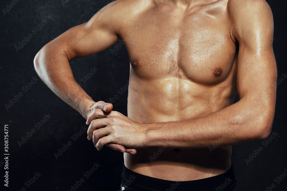young man flexing his muscles young man flexing his muscles
