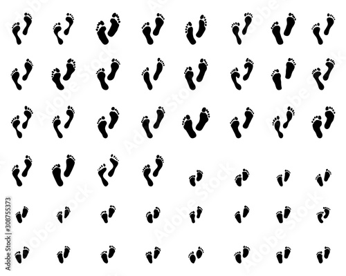 Black prints of human and children feet on a white background