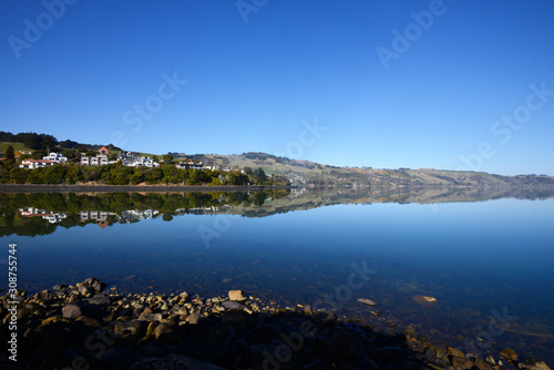 Beautiful reflection and lake under the daylight in Tekapo Lake in South Island New Zealand.