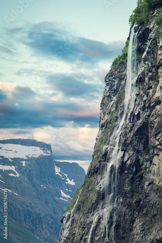 Fototapeta Naklejka Na Ścianę i Meble -  Waterfall over the Geiranger fjord