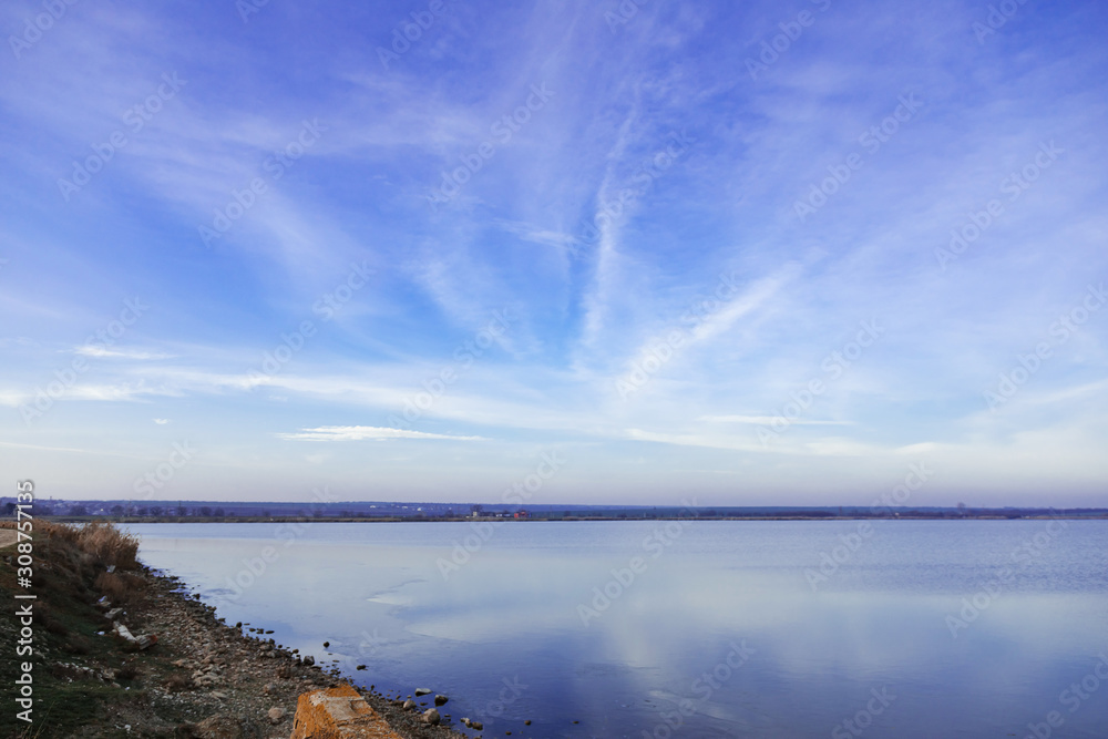 sunset sky blue and pink over a lake in Gagauzia