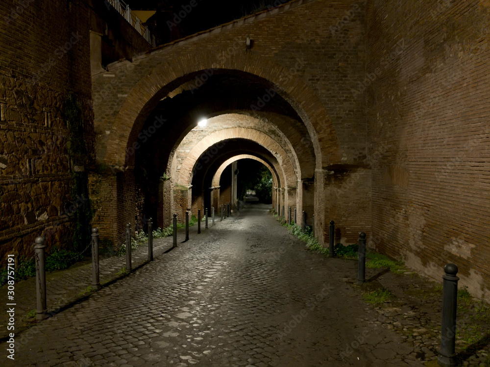 Caelian hill rampant arches at night in Rome