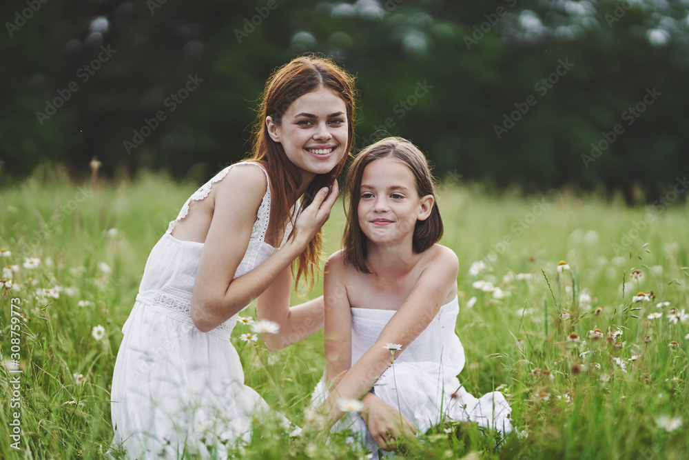 mother and daughter in the park mother and daughter in the park