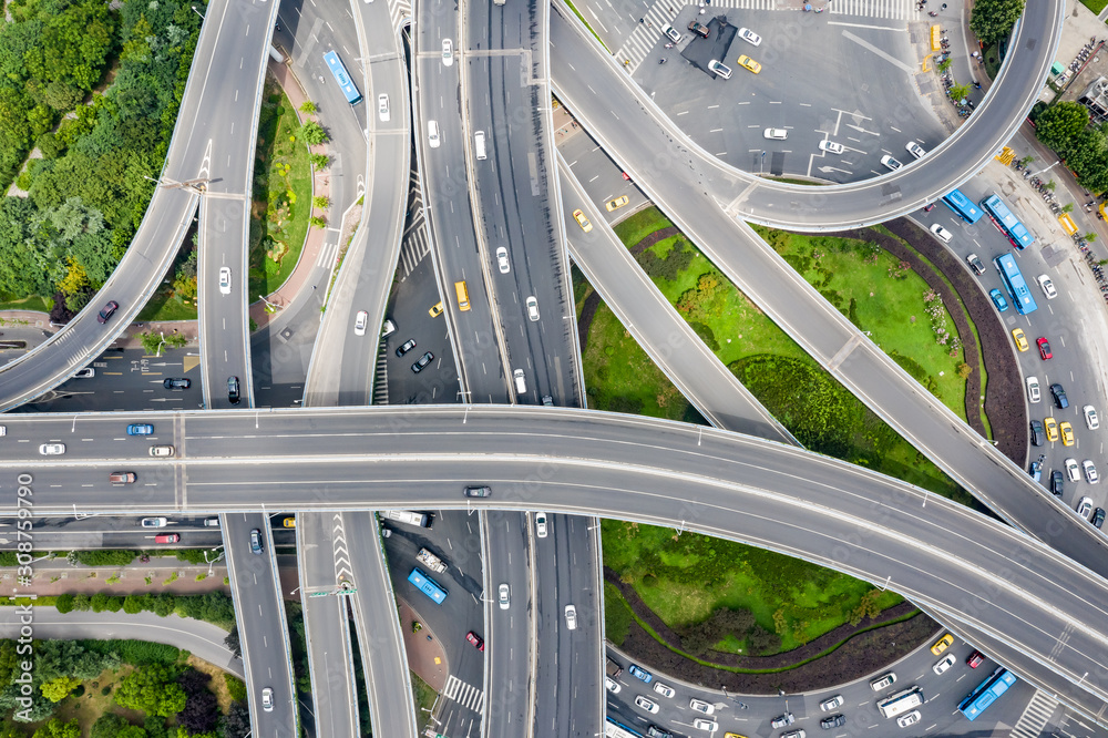 Aerial view of a massive highway intersection - obrazy, fototapety, plakaty 