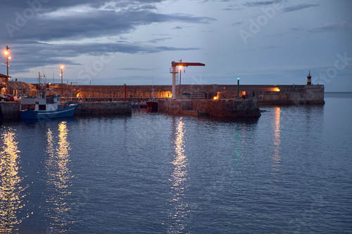 Night view of a fishing port in the north of Spain