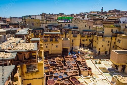 Fes, Morocco. Old town panorama,tanneries and tanks with color paint for leather. Morocco Africa © Kotangens