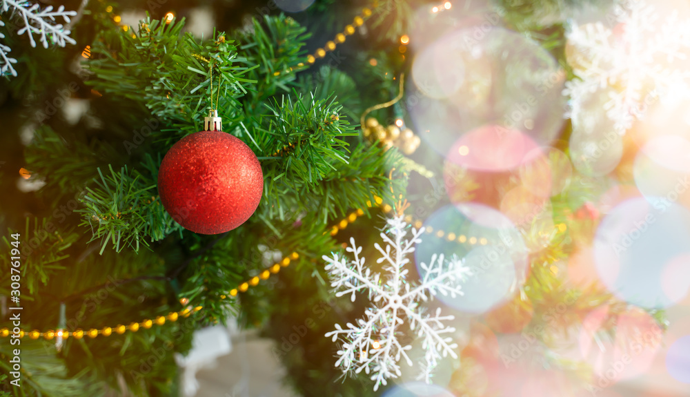 Obraz premium Beautiful Christmas tree with festive decor on bokeh background. Space for text. Holidays,Festive background, congratulation, copy space,gifts, background,copy space,place for text.