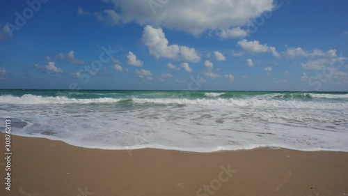 Beautiful seashore. Balni bathed with white foam sandy shore.