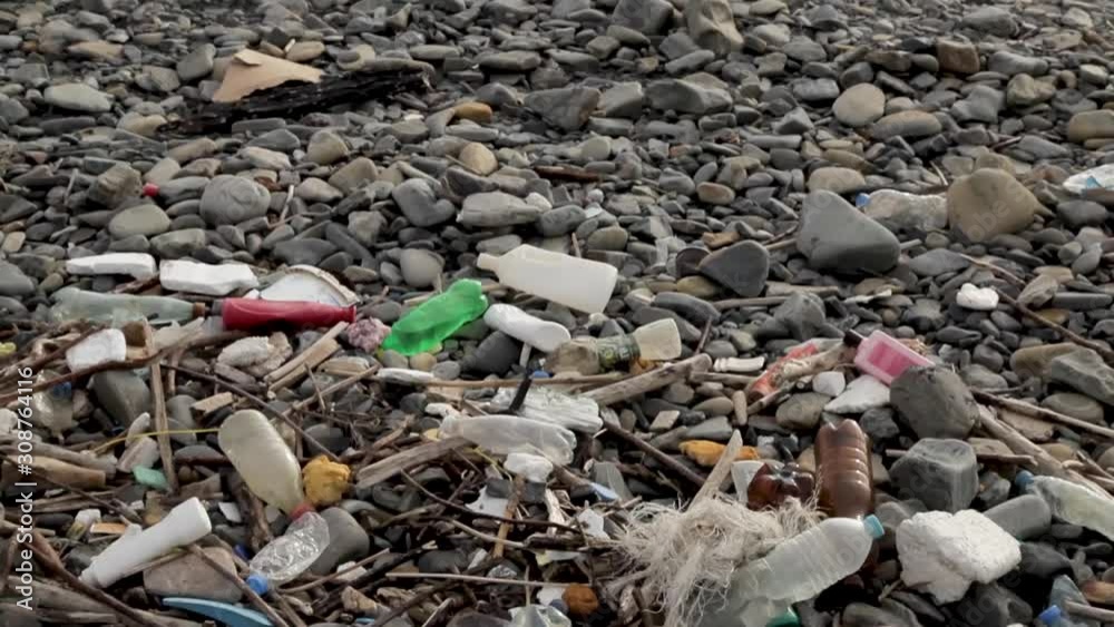 Plastic bottles of the beach and in sea. Black Sea, Tuapse, Russia Plastic bottles of the beach and in sea. Black Sea, Tuapse, Russia
