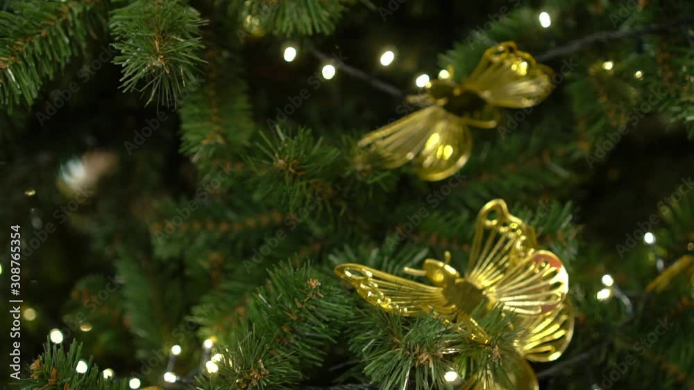 Christmas decorations on the Christmas tree. Butterflies. Christmas decorations on the Christmas tree. Butterflies.