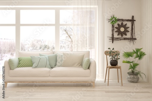 Stylish room in white color with sofa and winter landscape in window. Scandinavian interior design. 3D illustration