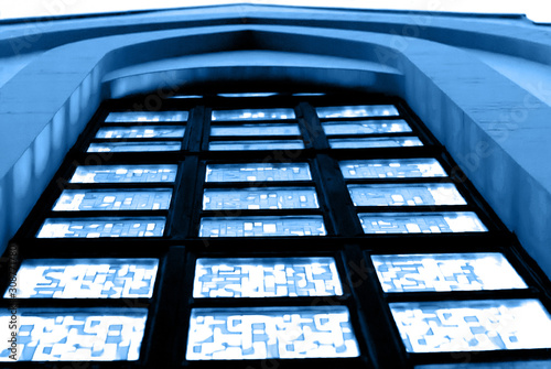 Gothic church window, toned blue photo photo