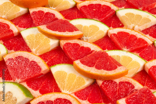 Pomelo and grapefruit slices background.