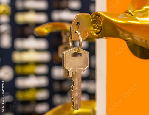 The key is in the door lock.