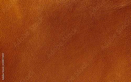 Leather. texture of genuine leather is brown. The structure of the skin material close-up. 