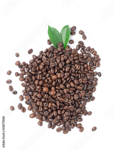 Coffee beans and green leaves on a white background.