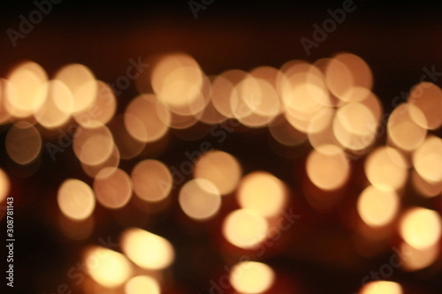 Bokeh of the candle on the golden mounth