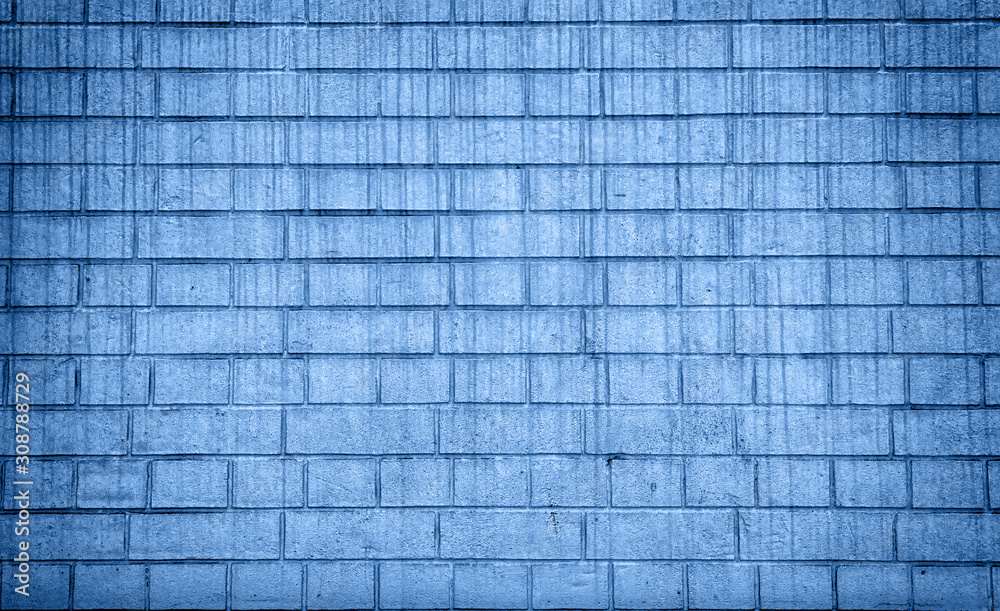 Grunge brick wall texture, copy space. Classic blue background. Color of the year 2020. Top view, flat lay Grunge brick wall texture, copy space. Classic blue background. Color of the year 2020. Top view, flat lay