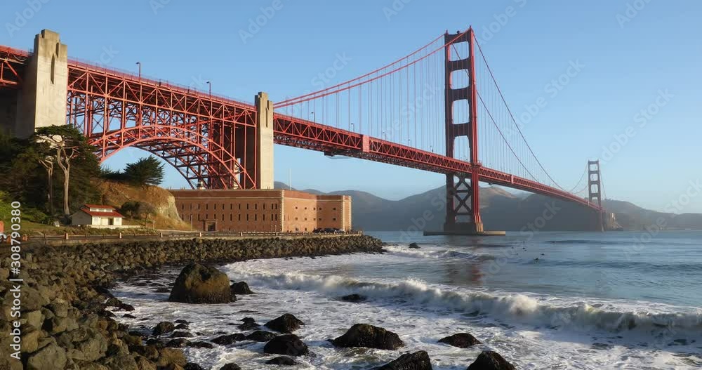 Golden Gate Bridge and Fort Point San Francisco Bay Waves Video Loop Surfers enjoy breaking waves on the San Francisco Bay by the historic Golden Gate Bridge and Fort Point.