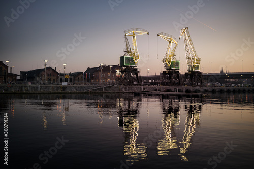 Dźwigozaury - Cranesaurs - colorfully illuminated cranes on the quay of Szczecin Łasztownia 