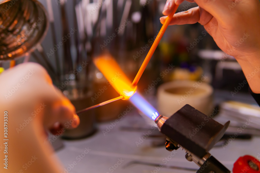hand-made glass beadmaking in a glass-blowing workshop hand-made glass beadmaking in a glass-blowing workshop