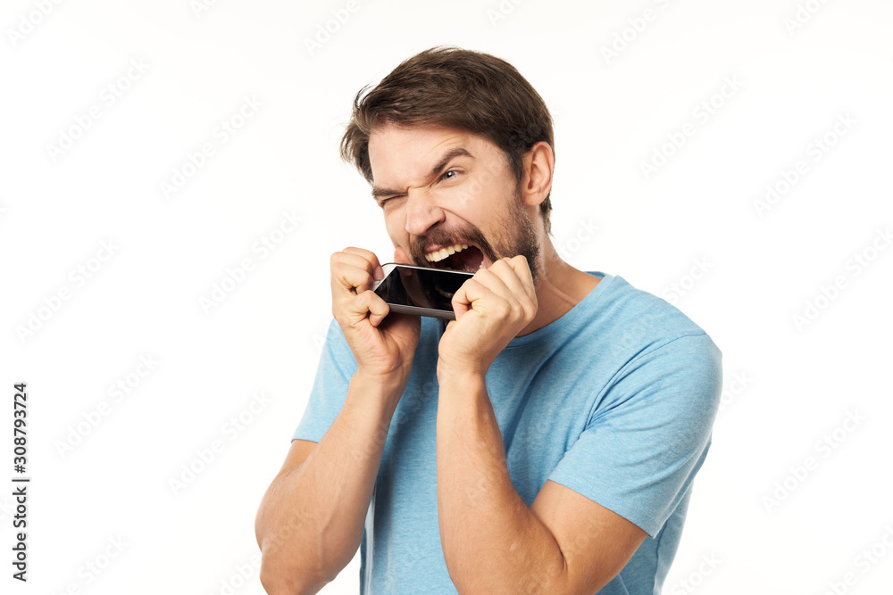 young man talking on the phone isolated on white young man talking on the phone isolated on white