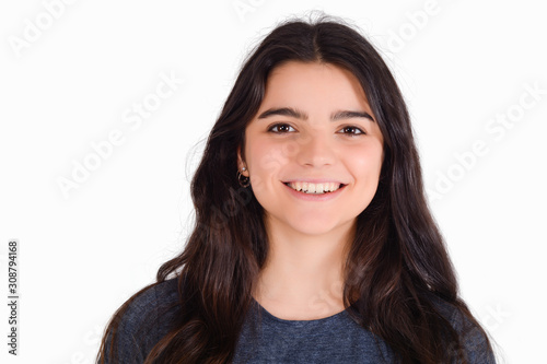 Portrait of young woman in a studio. © Mego-studio