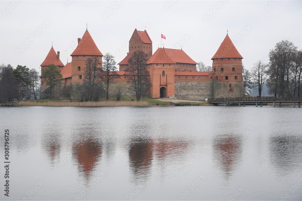 Medieval castle of Trakai, Vilnius, Lithuania, Eastern Europe, located between beautiful lakes and nature with reflections on the water