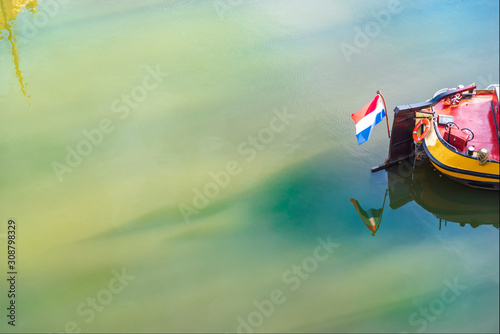 Flag of the Netherlands on an old ship.