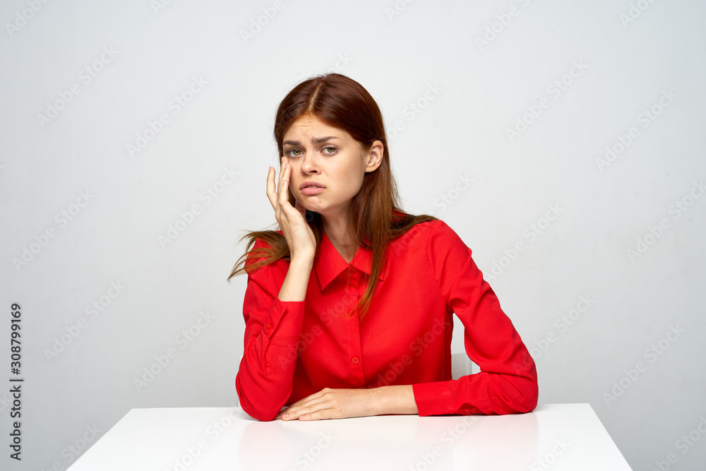 portrait of young woman sitting on sofa portrait of young woman sitting on sofa