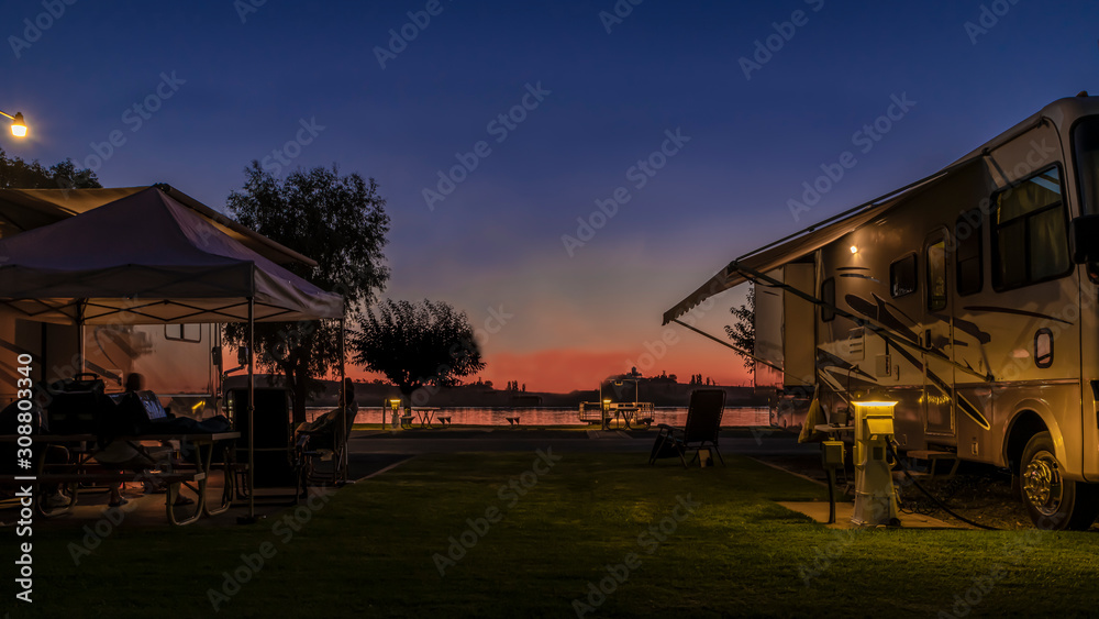 Long exposure photo at a Rv park during a sunset on the delta in Rio Vista Ca. with people enjoying the evening Long exposure photo at a Rv park during a sunset on the delta in Rio Vista Ca. with people enjoying the evening
