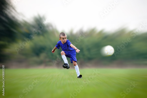 Soccer kid kicking a ball © marritch