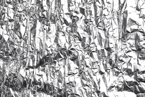 Fototapeta Naklejka Na Ścianę i Meble -  Crumpled silver foil as background, closeup view