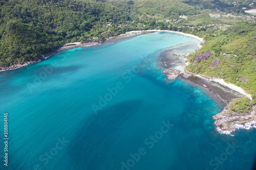 Aerial view of bay with white sand beach in Seychelles, Mahe Island