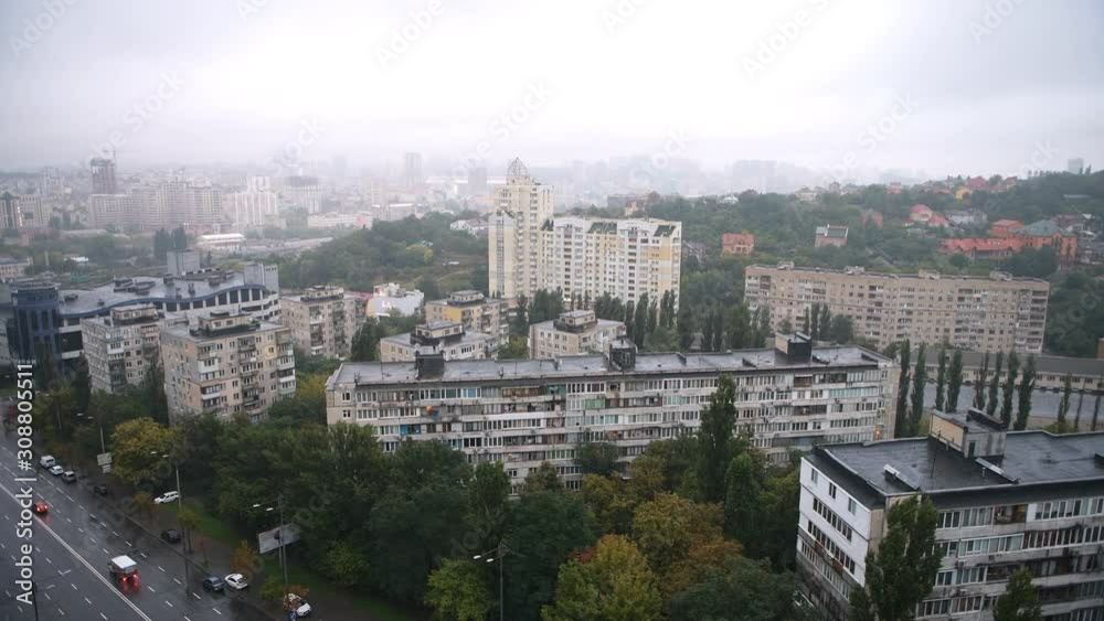 Loopable cinemagraph of aerial high angle view on Kiev Railway main station area apartment buildings or houses homes in Kyiv in morning rain by road street, cars in Ukraine Loopable cinemagraph of aerial high angle view on Kiev Railway main station area apartment buildings or houses homes in Kyiv in morning rain by road street, cars in Ukraine