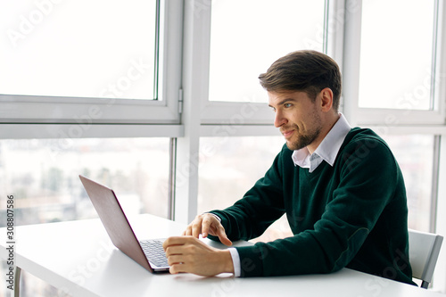 businessman working on laptop in office © SHOTPRIME STUDIO